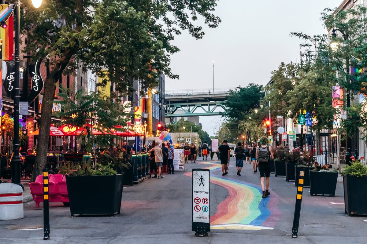 Montreal, Canada - August 12, 2025: Sainte-Catherine Street, Village (Gay Village) with rainbow crosswalk