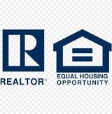 REALTOR and Equal Housing Opportunity logos in dark blue on transparent background